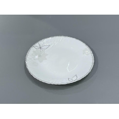 Тарілка пласка біла порцелянова з квітковим декором хвиляста облямівка